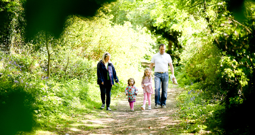 A family walking through Nugent's Wood, Portaferry